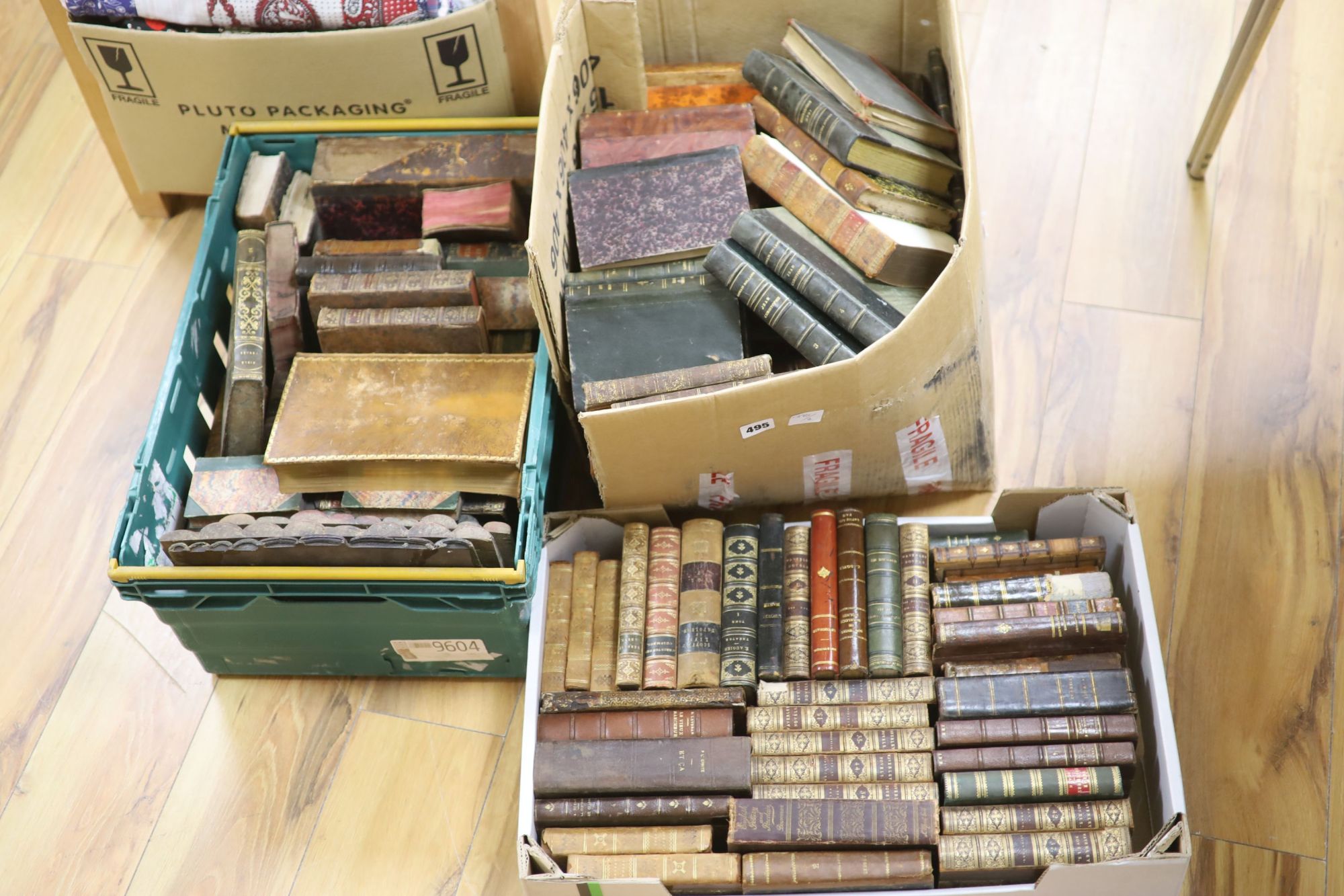 Three boxes of various decorative bindings